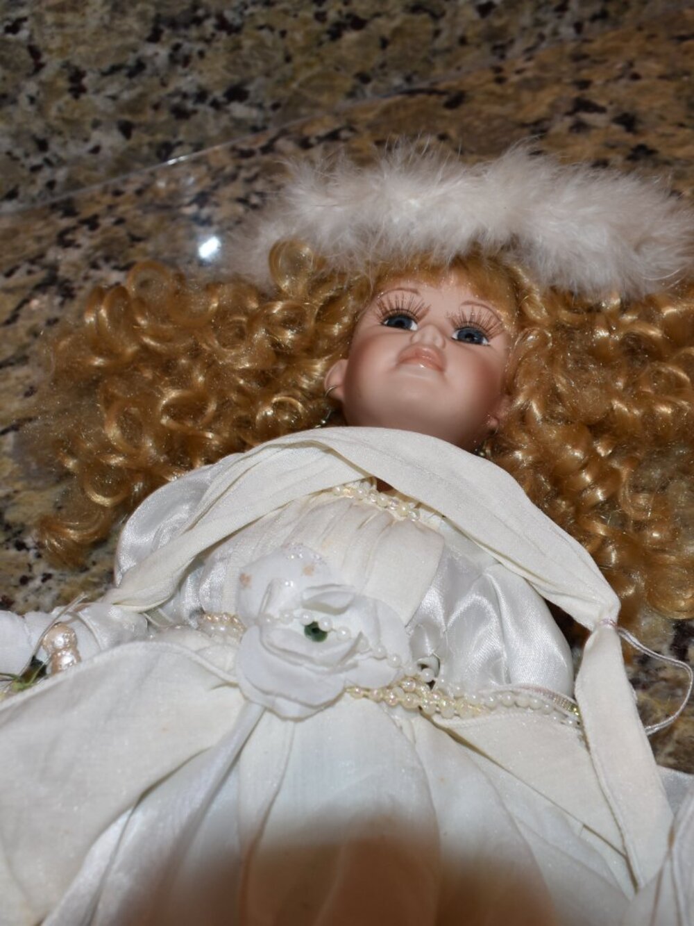 Vintage Porcelain Doll in White Dress with Blonde Curly Hair